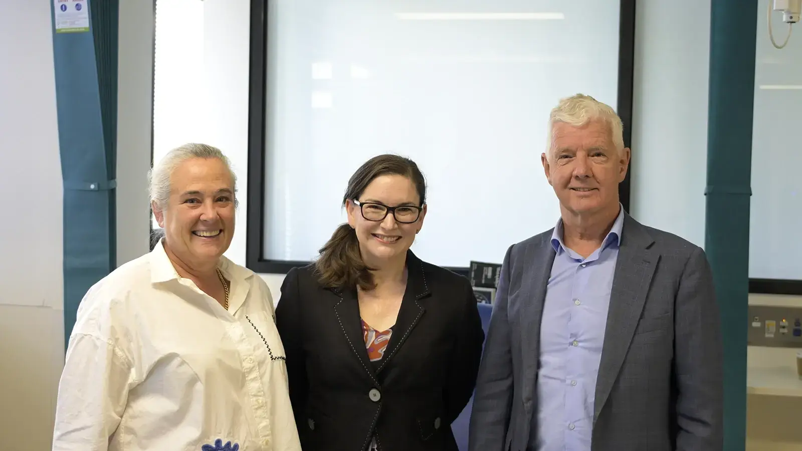 Associate Professor Sophie Wallace, Professor Trisha Peel and Professor Paul Myles in a group photo
