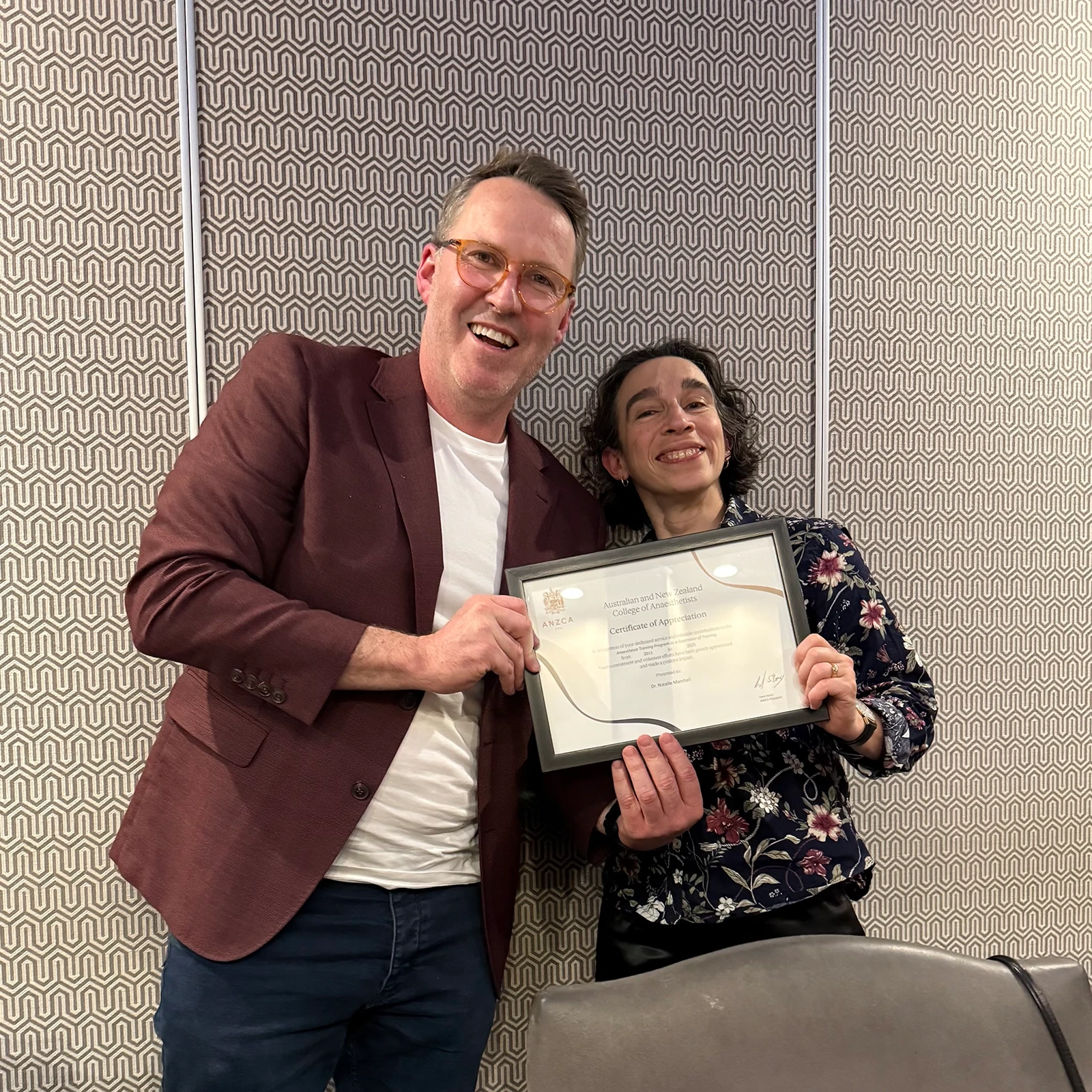 Dr Martin Dempsey (ACT Regional Chair) congratulates Dr Natalie Marshall on her 14 years as an ACT SOT