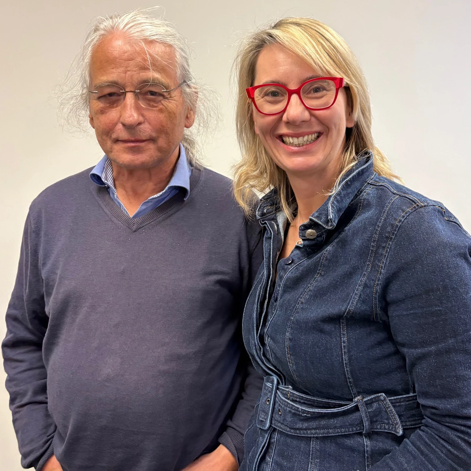 Two people standing