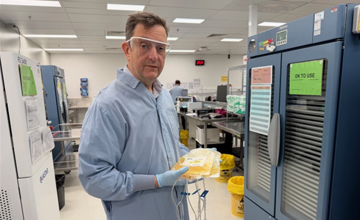 Medical researcher holding blood platelets: Image supplied by University of Queensland