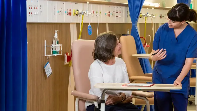 Photo of patient and doctor speaking